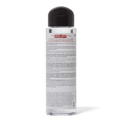 Proclaim Glossing Polish being applied to hair for frizz control and smoothness