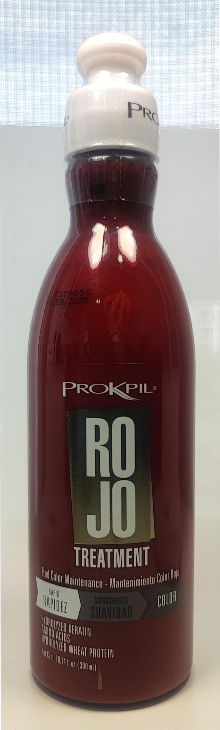 Prokpil Red Maintenance application on hair showing even distribution