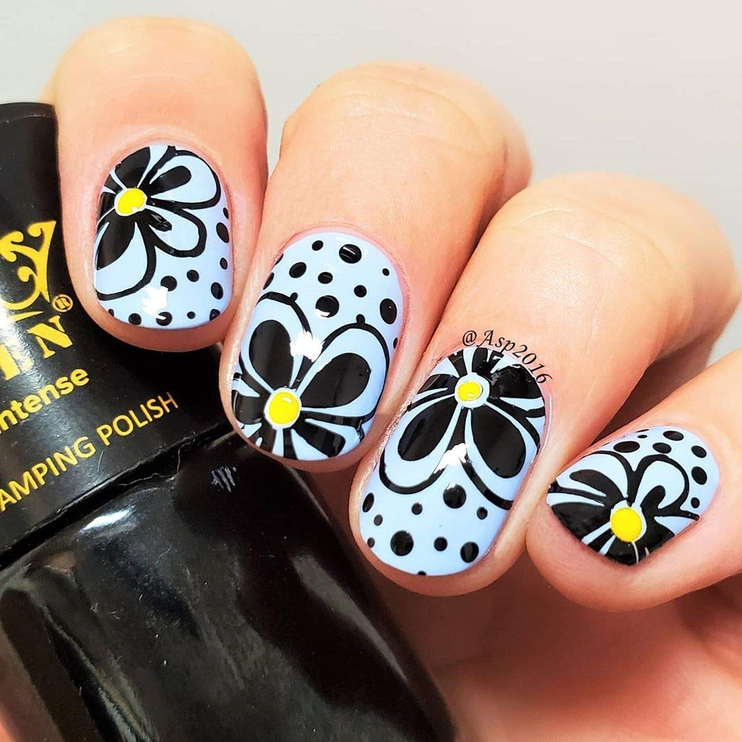 PUEEN stamping polish applied on nail demonstrates fine detail work.