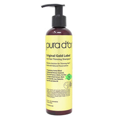 PURA D'OR Original Gold Label bottle pour showing scalp-nourishing wash benefits