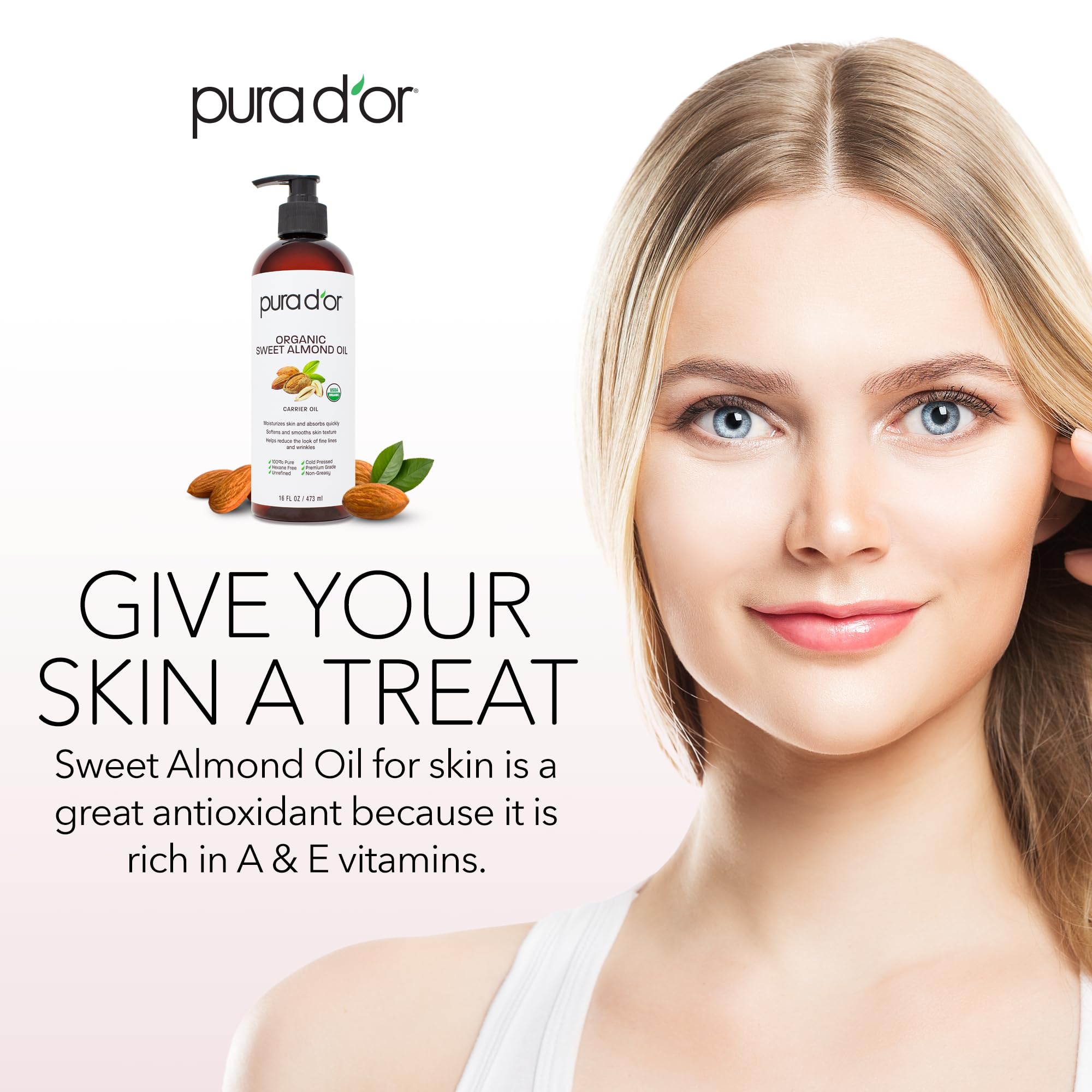 PURA D'OR Sweet Almond Oil drops on hand illustrating moisturizing application.