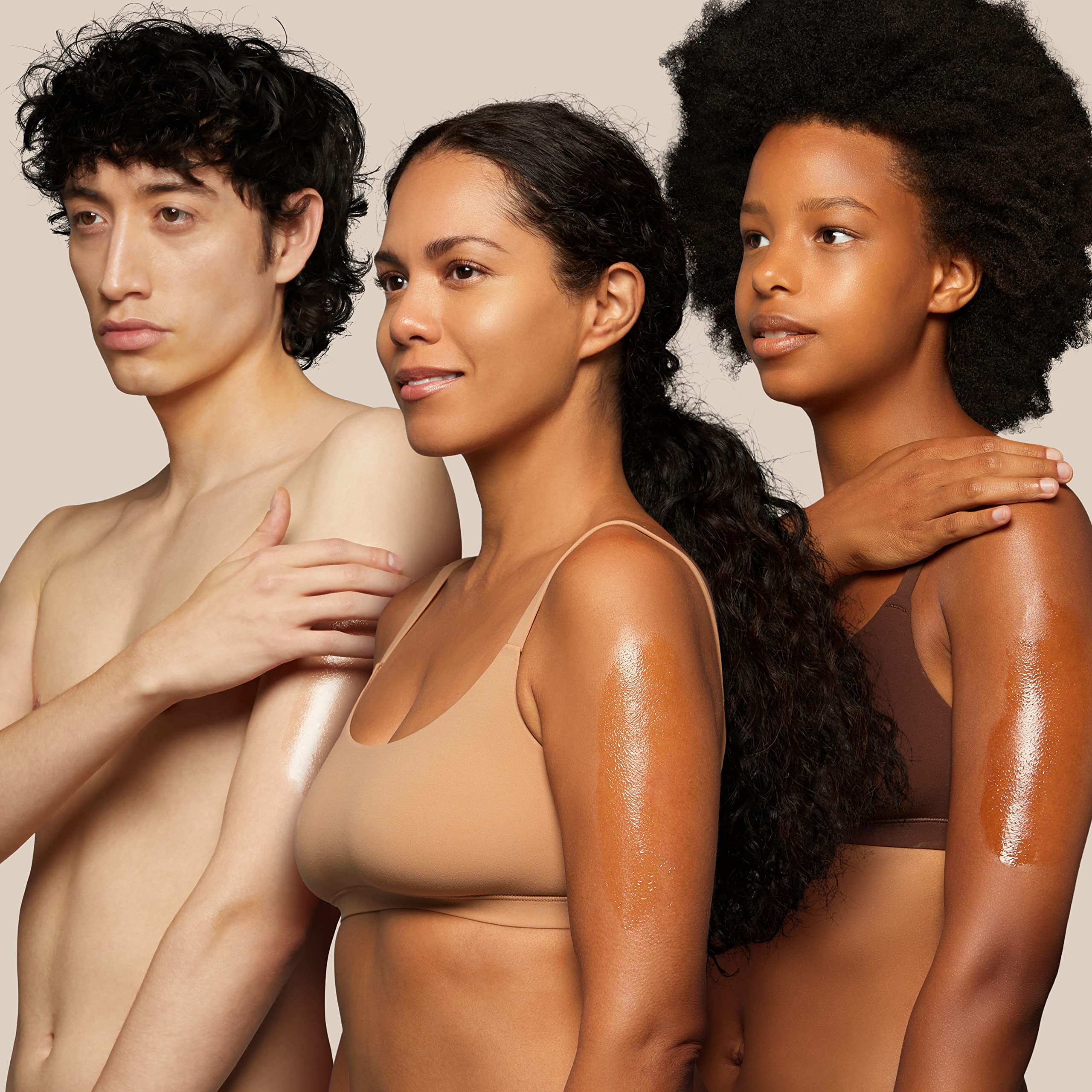 Pure Body Naturals Sweet Almond Oil applied to skin for quick absorption and hydration.