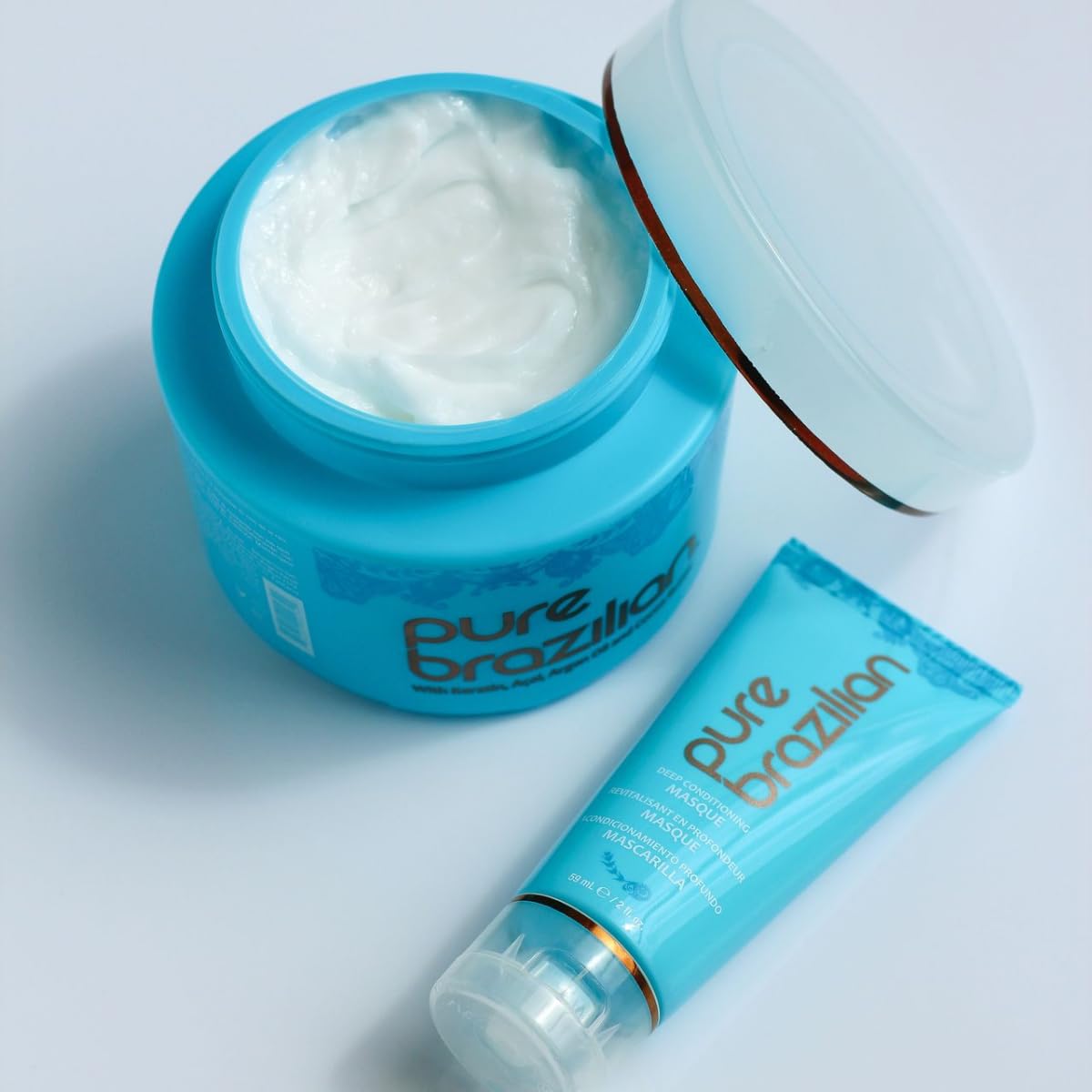 Pure Brazilian Deep Conditioning Masque on vanity showing glossy frizz-free hair implication