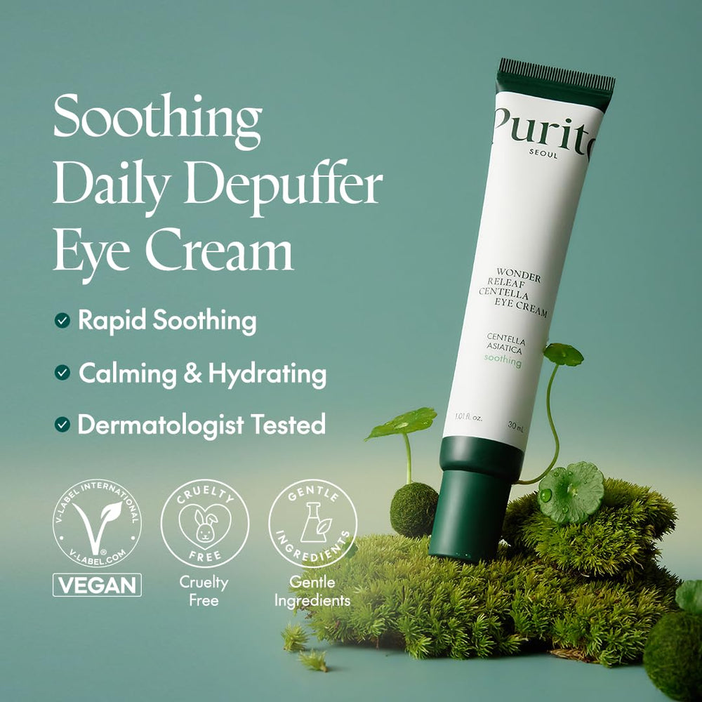 Applying PURITO Centella Eye Cream under the eye for depuffing.