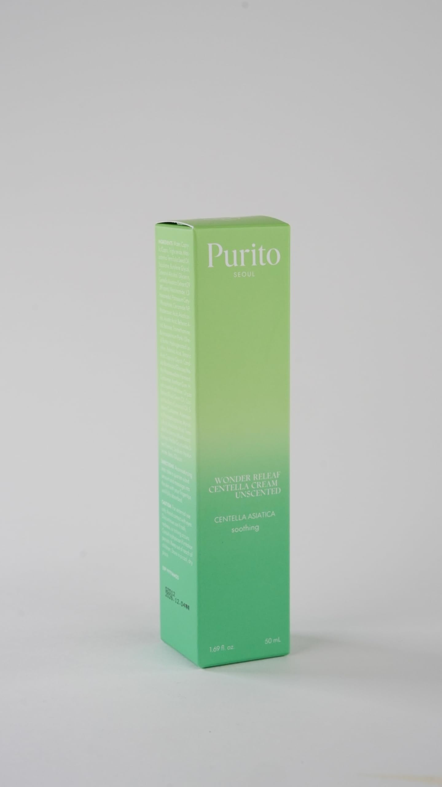 PURITO Centella Unscented Cream jar surrounded by calming ingredients emphasizes moisture-locking formula.
