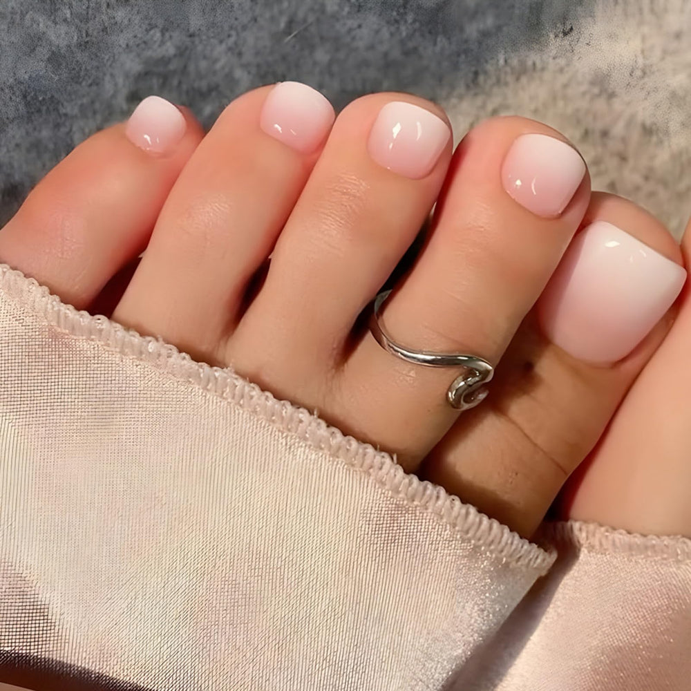 Puyokinm nude press-on toenails package with 24 pieces and tools for DIY pedicures