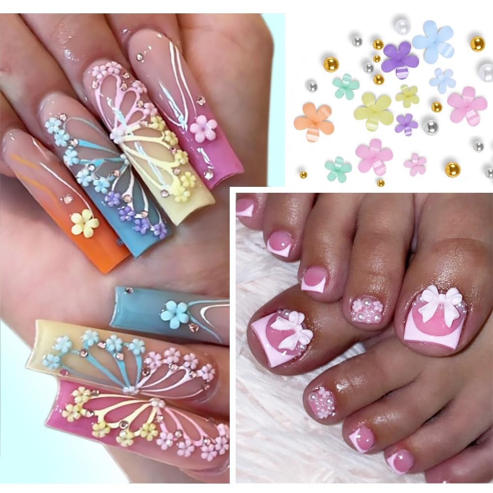 Qdsuh nail charms closeup showing metal beads and flatback flowers.