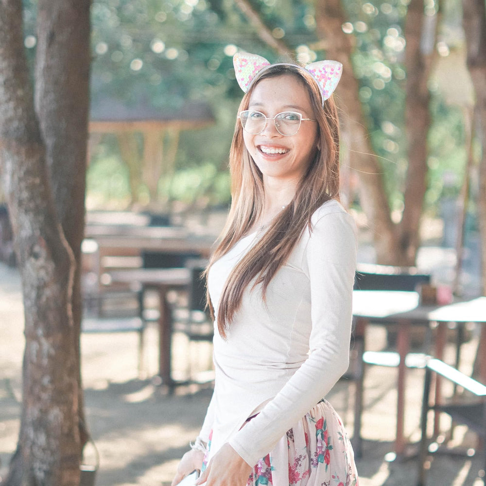 Qianyu sequin cat ears headband worn model demonstrates comfortable secure fit