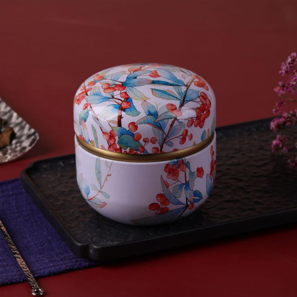 Qopoto Ormosia elegant powder box close-up showcasing artist patterns.