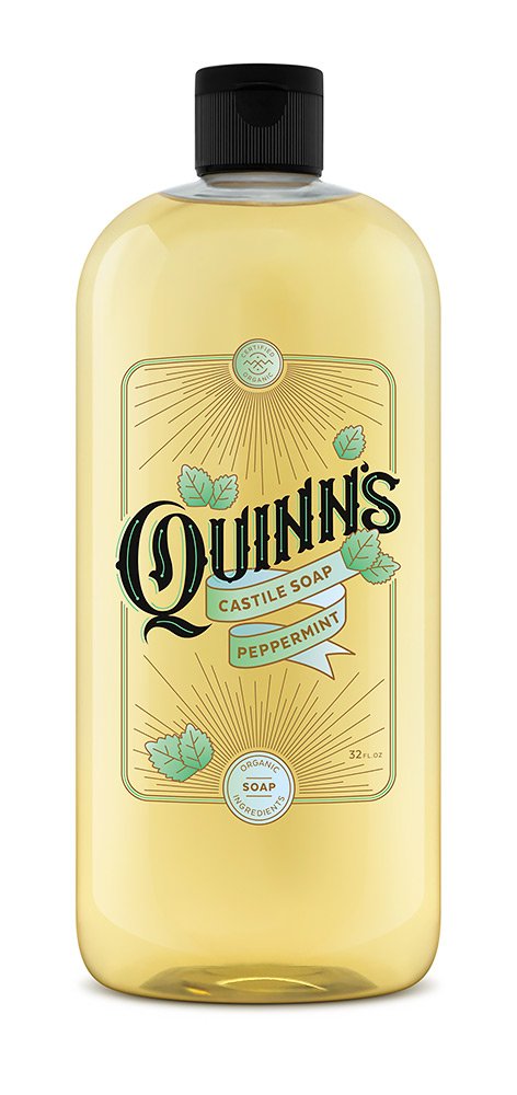Quinn's Pure Castile Peppermint bottle showcases versatile organic soap for body and cleaning.