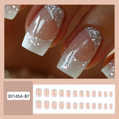 QUNQINLI nude pink press-on nails with silver foil for party-ready glam looks.