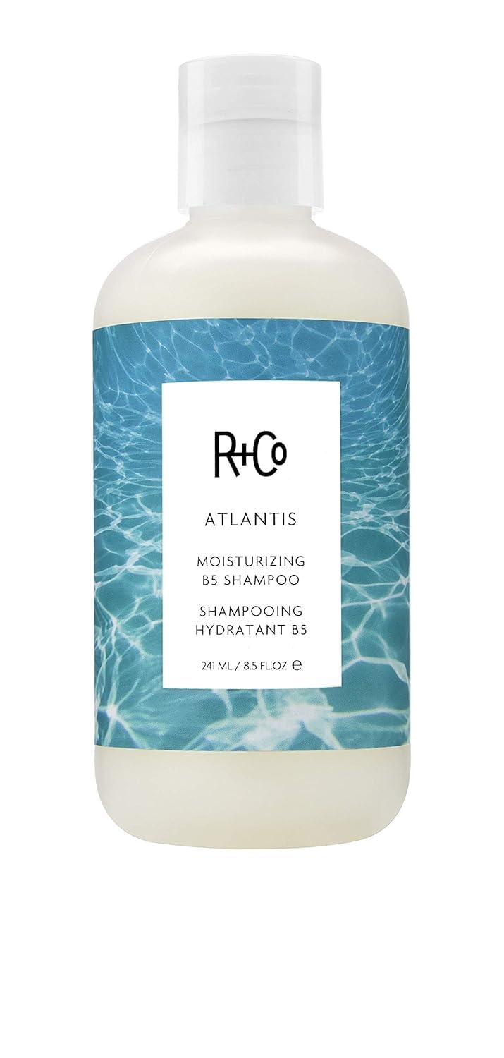 R+Co ATLANTIS bottle with pump emphasizes hydration for shiny hair.