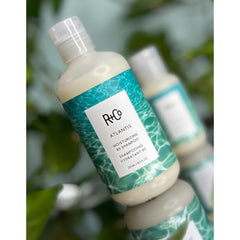R+Co ATLANTIS hair wet close-up showing balanced moisture and shine.