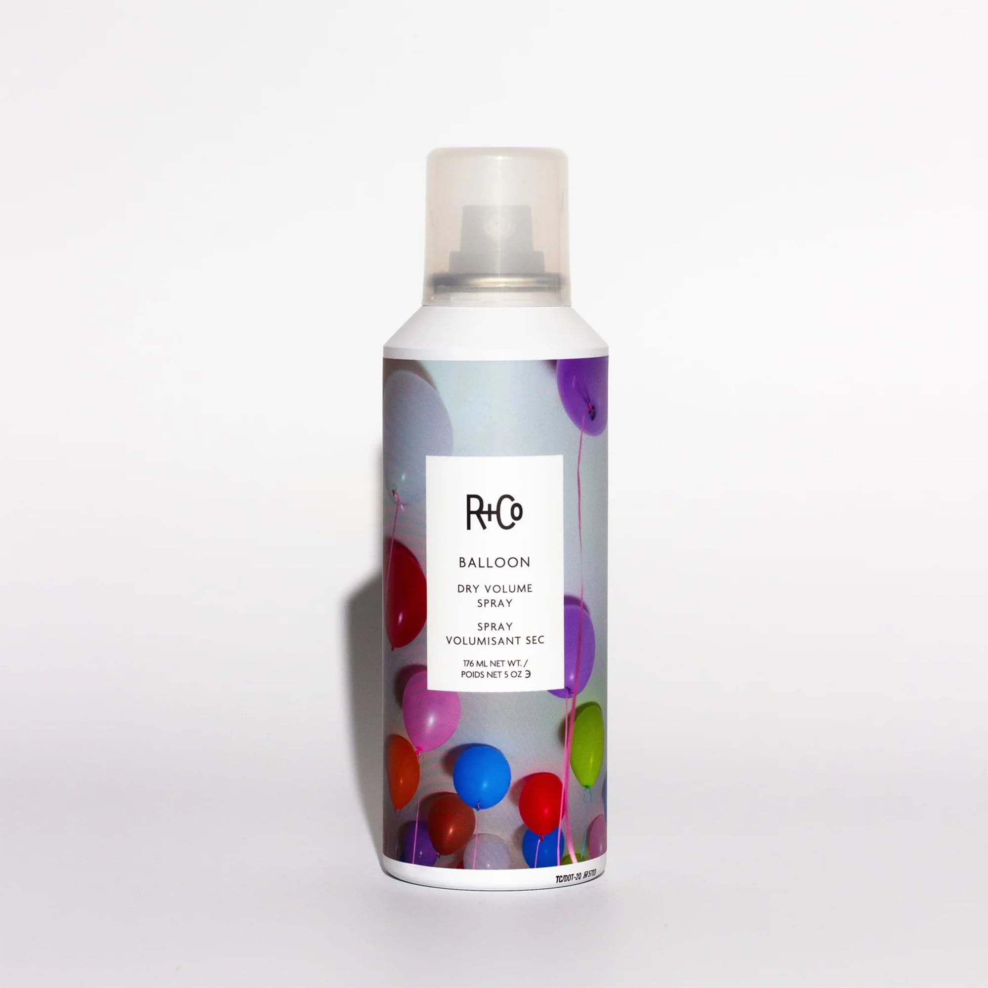 R+Co Balloon spray-mist application shows light, invisible droplets for a natural finish.