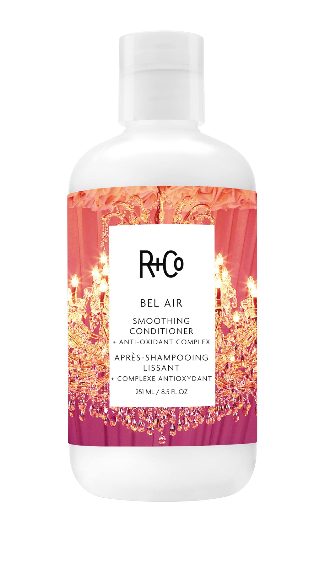 R+Co BEL AIR smoothing conditioner bottle emphasizes frizz control and silky shine.