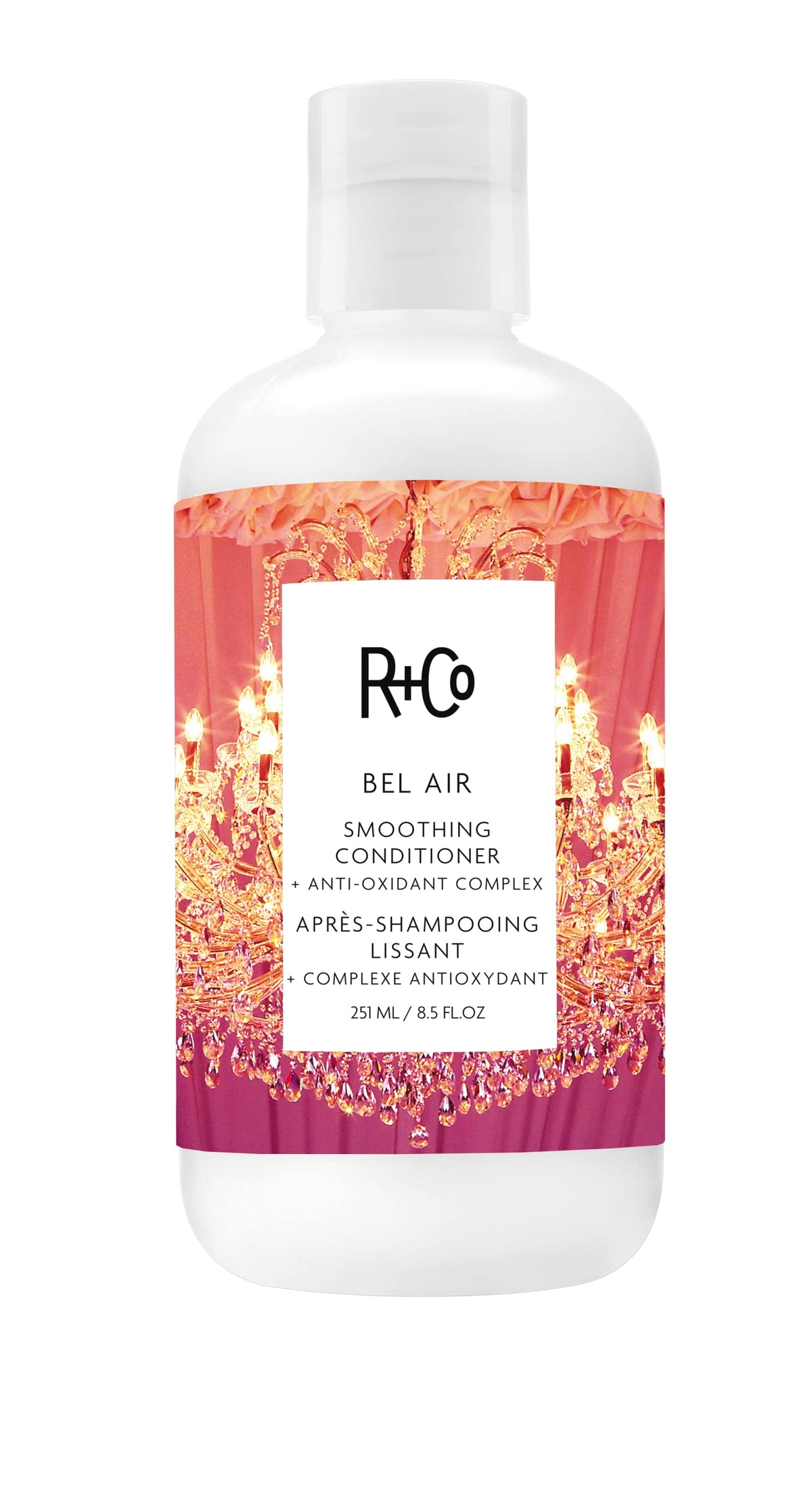 R+Co BEL AIR smoothing conditioner bottle emphasizes frizz control and silky shine.