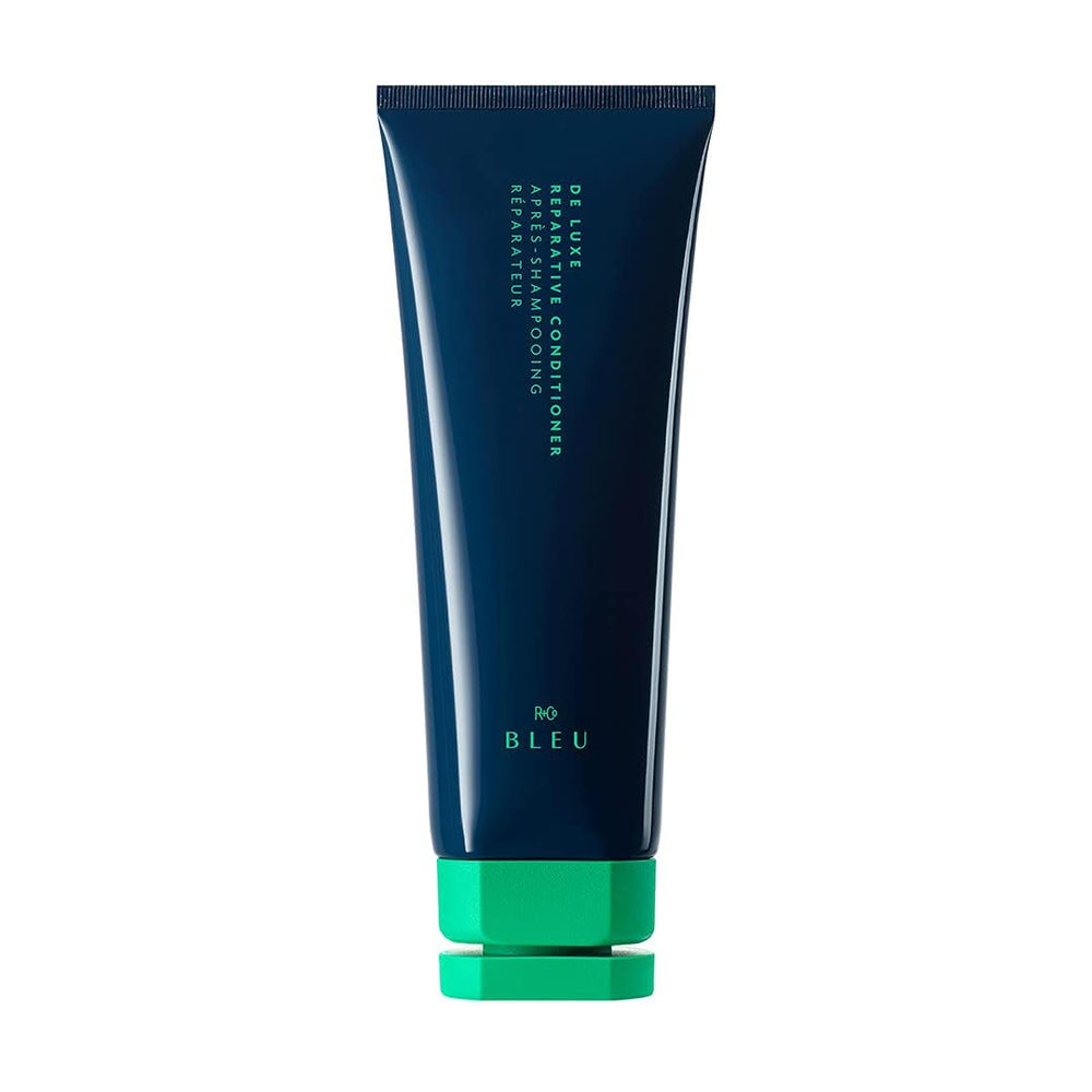 R+Co BLEU De Luxe bottle-pour demonstrates hydrating conditioner for frizz-prone hair