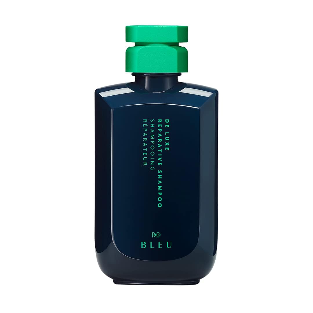 R+Co BLEU De Luxe shampoo bottle on a vanity promises hydration and shine