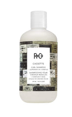 R+Co CASSETTE Curl Shampoo bottle ready for gentle curl cleansing.
