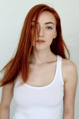 R+Co Gemstone Color Shampoo application onto hair, highlighting ease of use.