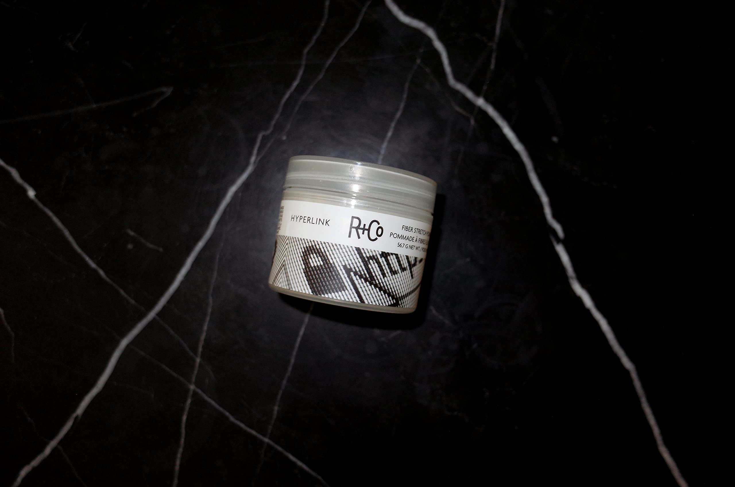 R+Co Hyperlink texture closeup highlights defined hair and shine