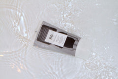 R+Co Television Masque applying to hair demonstrates easier manageability and elasticity