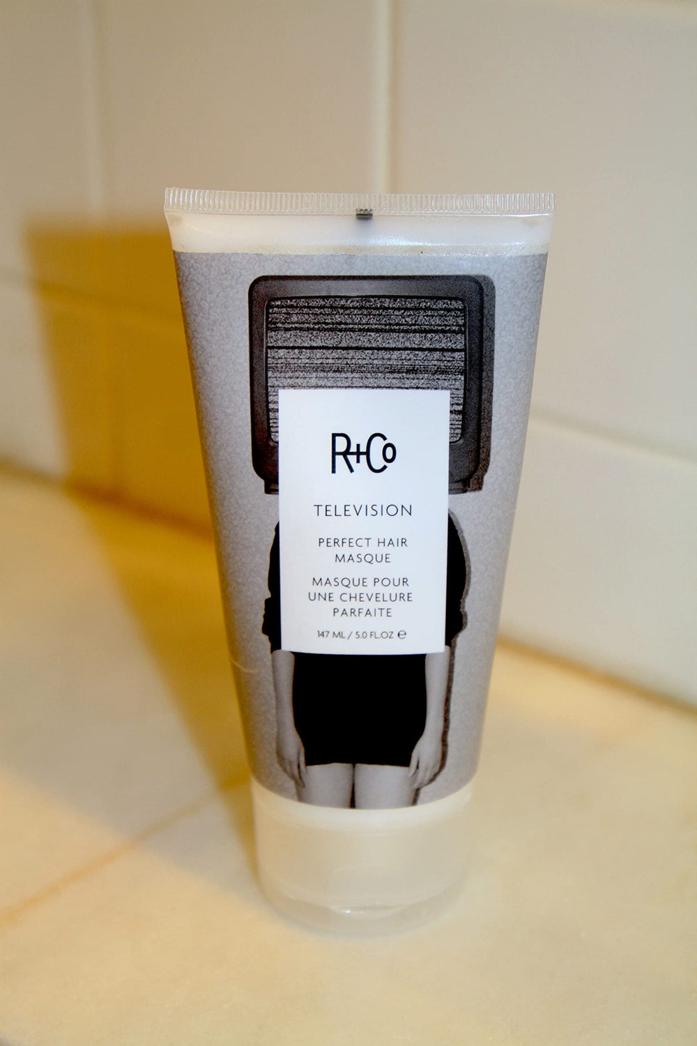 R+Co Television Masque texture closeup reveals silky finish and detangling-ready hair