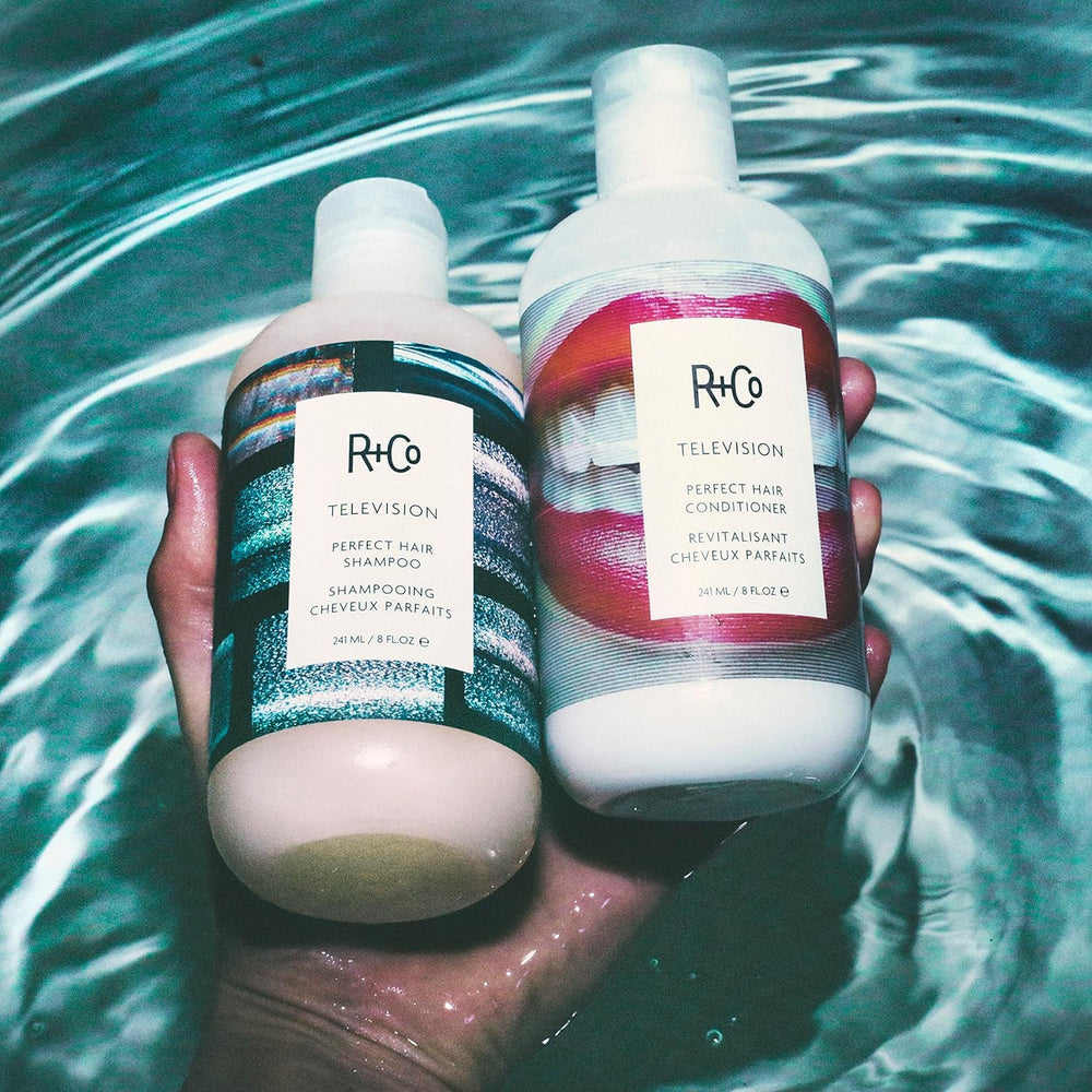 R+Co Television Perfect Hair bottle pour captures smooth, even distribution.