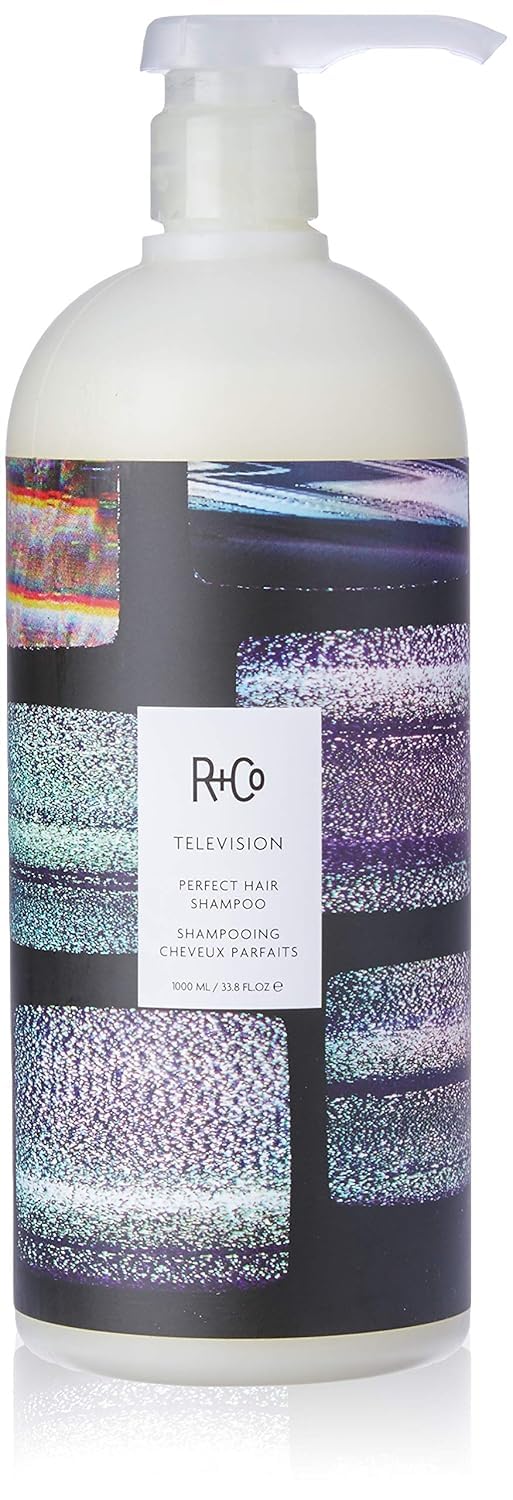 R+Co Television Perfect Hair Shampoo bottle closeup, showcasing sleek packaging and camera-ready shine.
