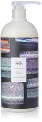 R+Co Television Perfect Hair Shampoo bottle closeup, showcasing sleek packaging and camera-ready shine.