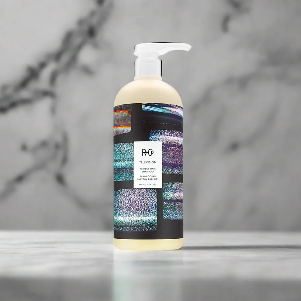 R+Co Television Perfect Hair Shampoo outer packaging on display.