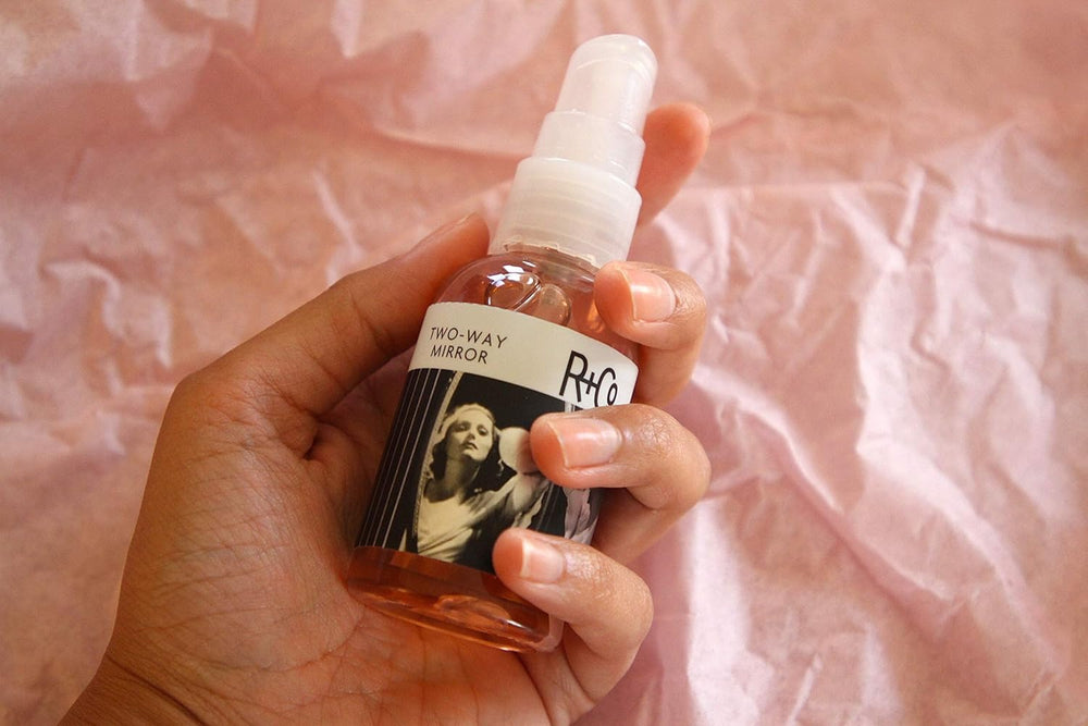 R+Co Two Way Mirror application on damp hair for easy smoothing