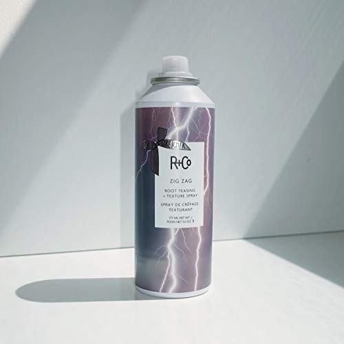R+Co Zig Zag Root Teasing Spray blends color across strands.