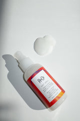 R+Co Hot Spell Thermotech Balm application shows smoothing balm ready for blowouts.