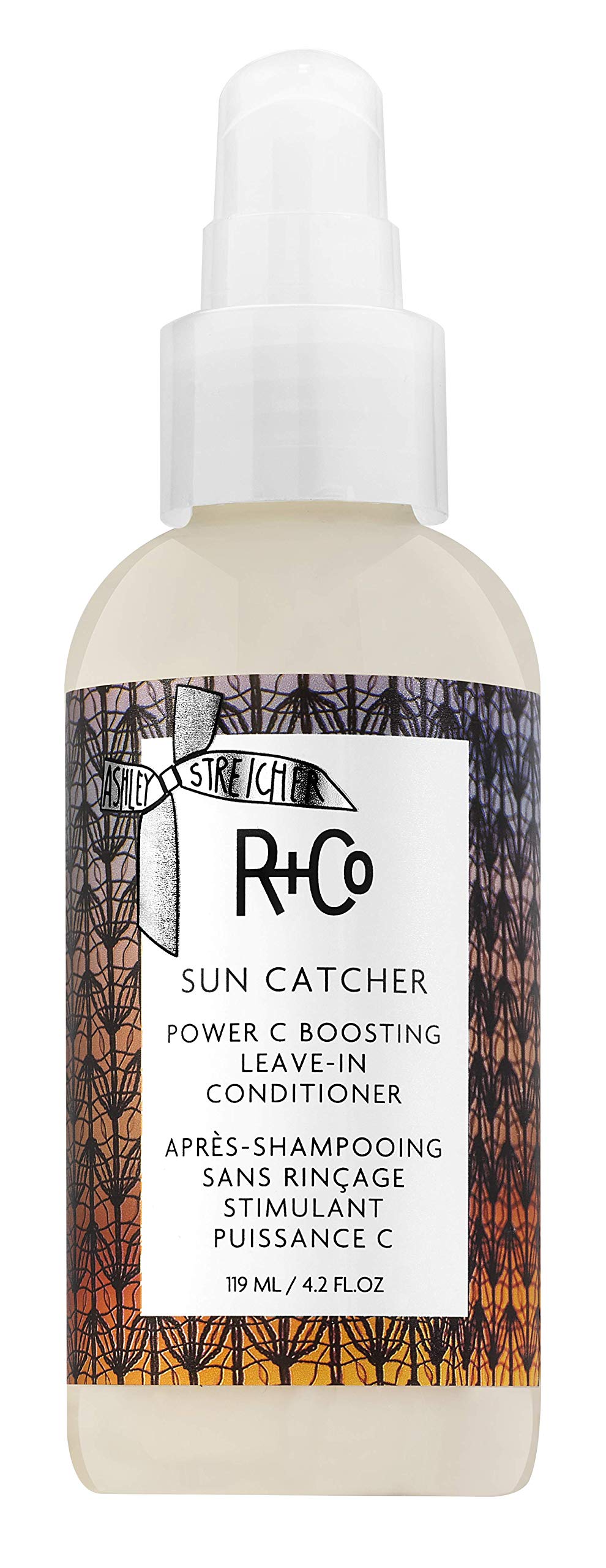 R+Co Sun Catcher Leave-In bottle pour for quick frizz control