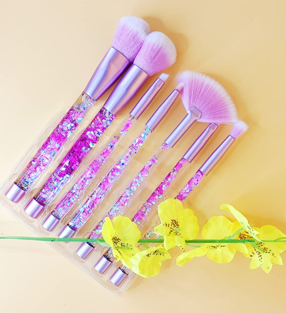 RAEEIKPHZ Sparkle Pink powder brush for seamless blending.