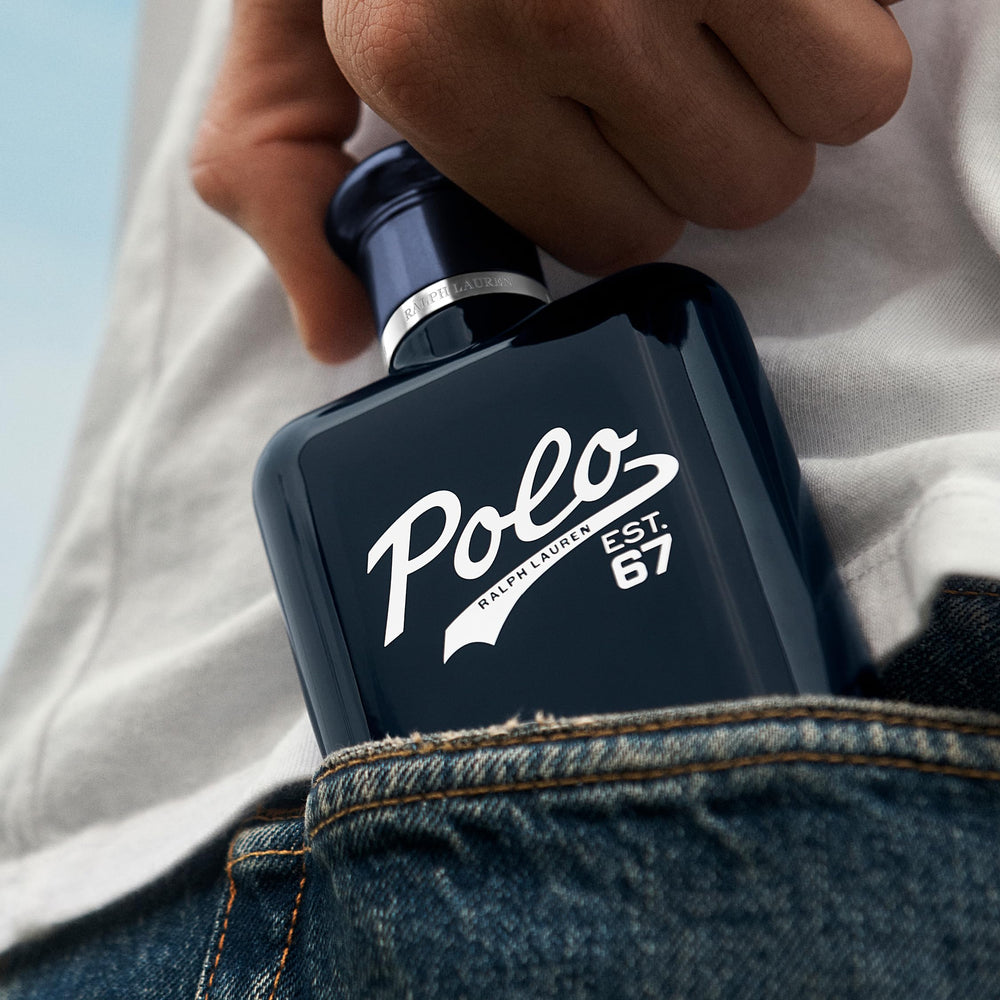 Polo 67 on wood backdrop conveys earthy, casual vibe
