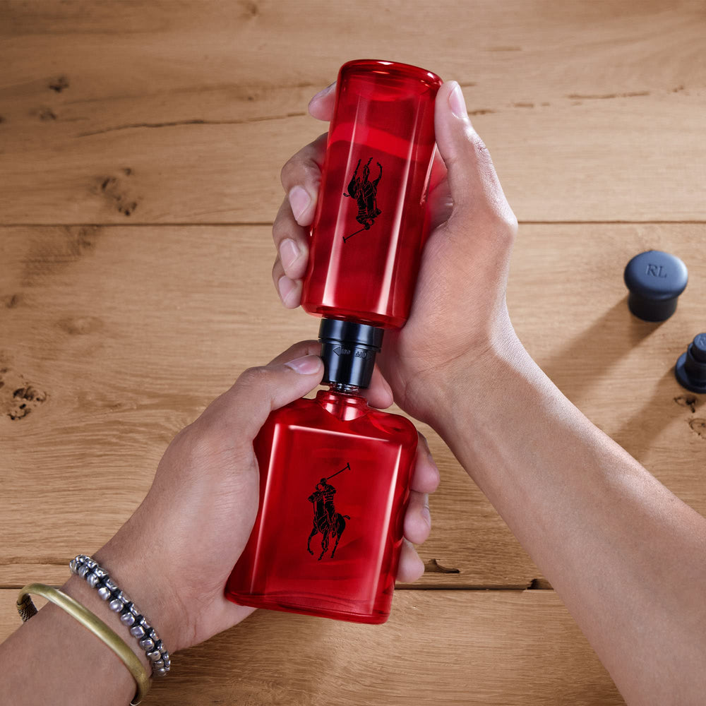 Ralph Lauren Polo Red refill bottle insert demonstrates an easy, eco-friendly refill process.