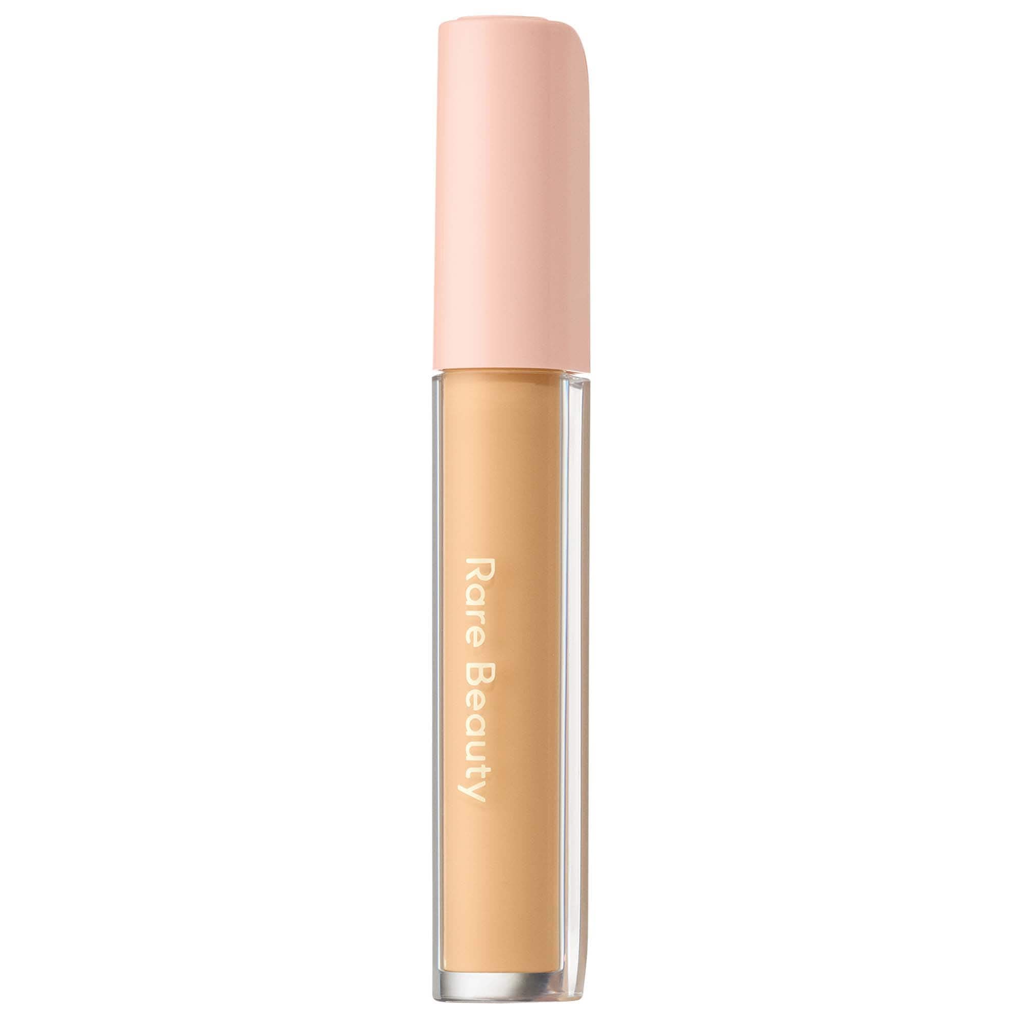 Rare Beauty under-eye brightener cream packaging shows travel-friendly 4ml size for on-the-go touch-ups