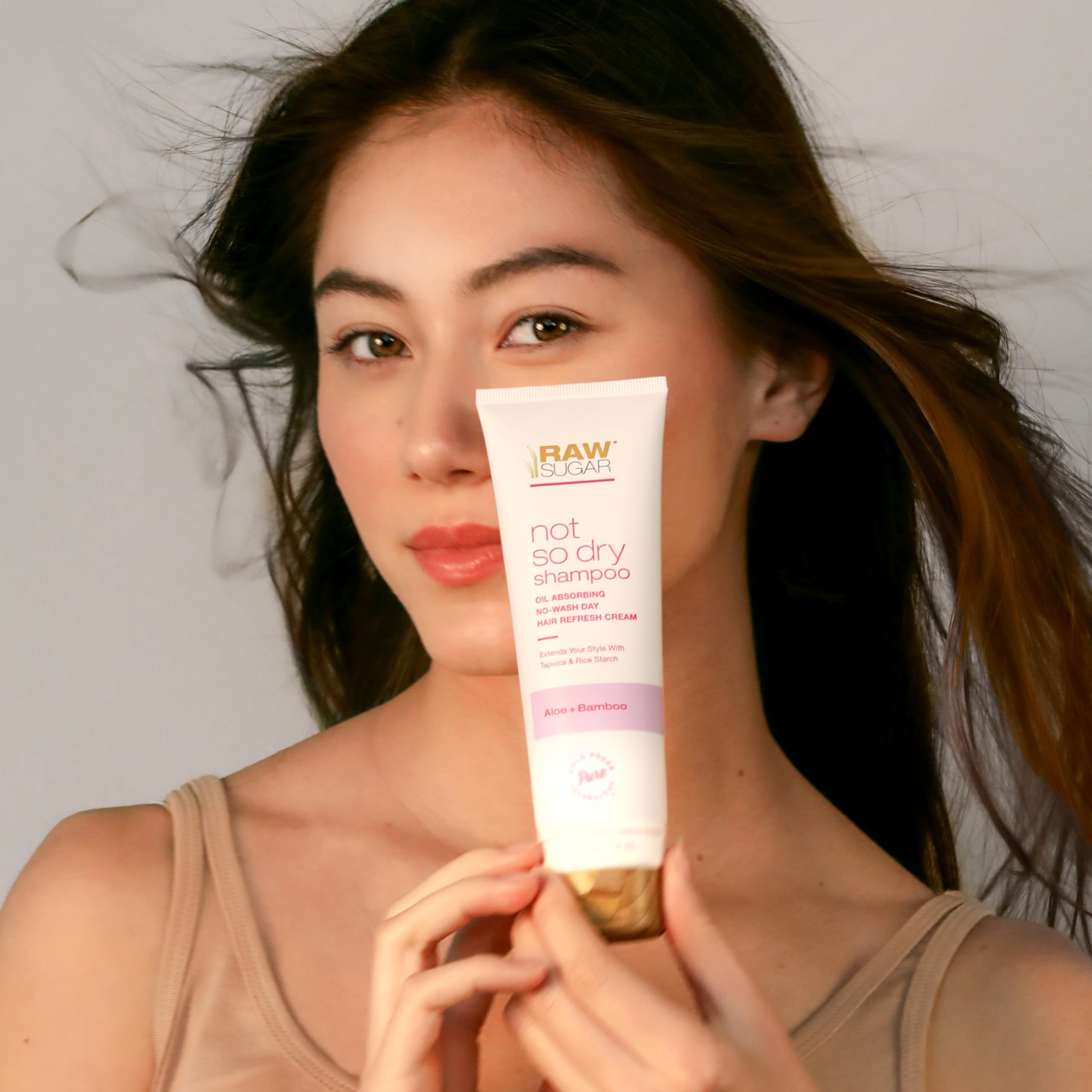 RAW SUGAR not-so-dry-shampoo-foam detail shows lightweight residue-free styling support.