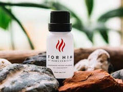 RawChemistry for Him 15ml bottle close-up highlighting portable design.