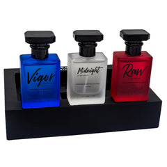 RawChemistry three-bottle collection display, versatile scents for day or night wear.