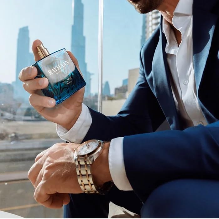 RAYHAAN Pacific for Men bottle-pour-shot captures vibrant citrus opening.