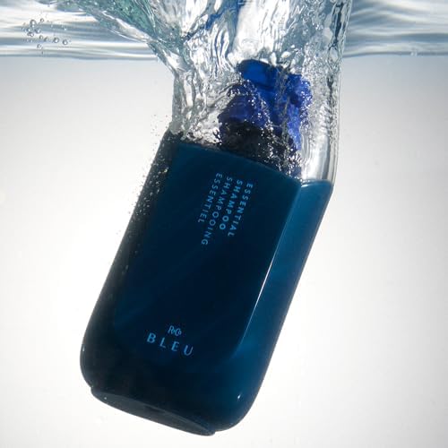 R+Co BLEU Essential Shampoo with antioxidant imagery suggesting protection for hair.