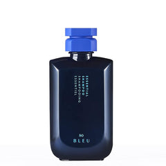 R+Co BLEU Essential Shampoo bottle closeup highlighting gentle cleansing and hydration.