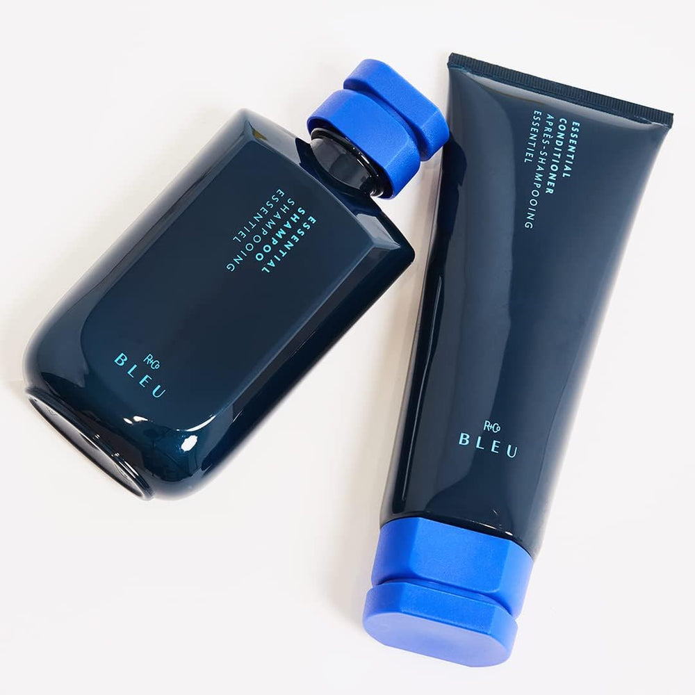 R+Co BLEU Essential Shampoo foam and lather conveying gloss and shine.