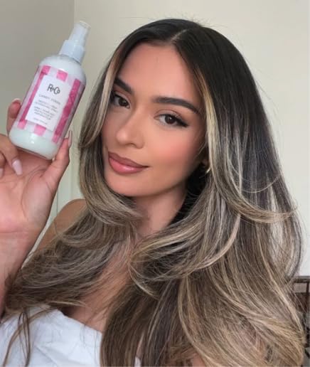 R+Co Candy Stripe product in environment setting — protects hair from environmental stress.