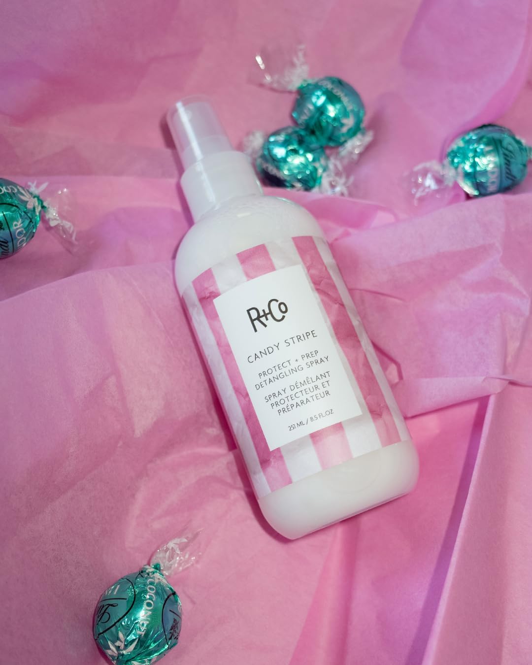 R+Co Candy Stripe hair close-up — roots-to-ends smooth with light hold.