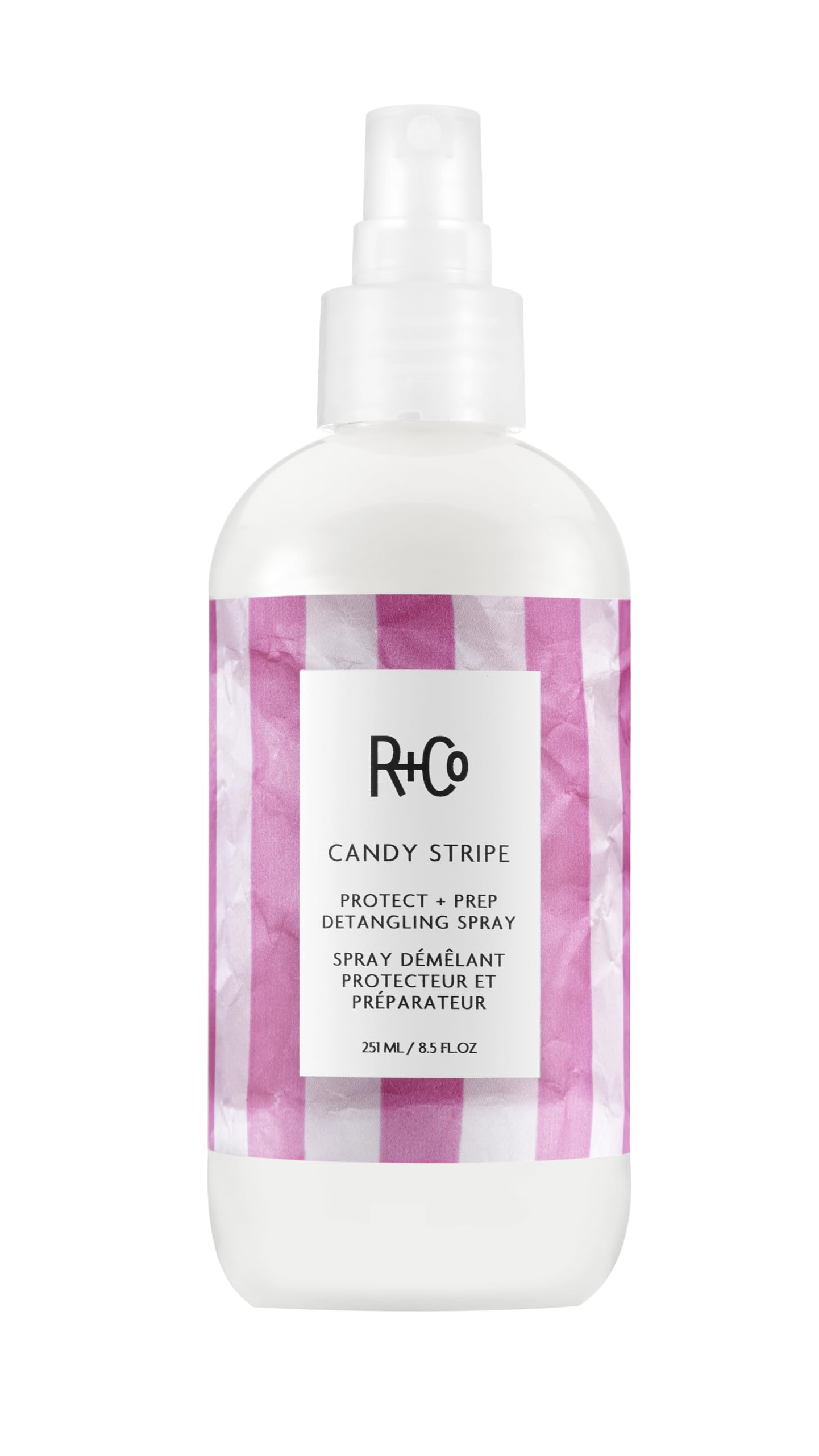 R+Co Candy Stripe bottle front view — detangler preps hair for styling.