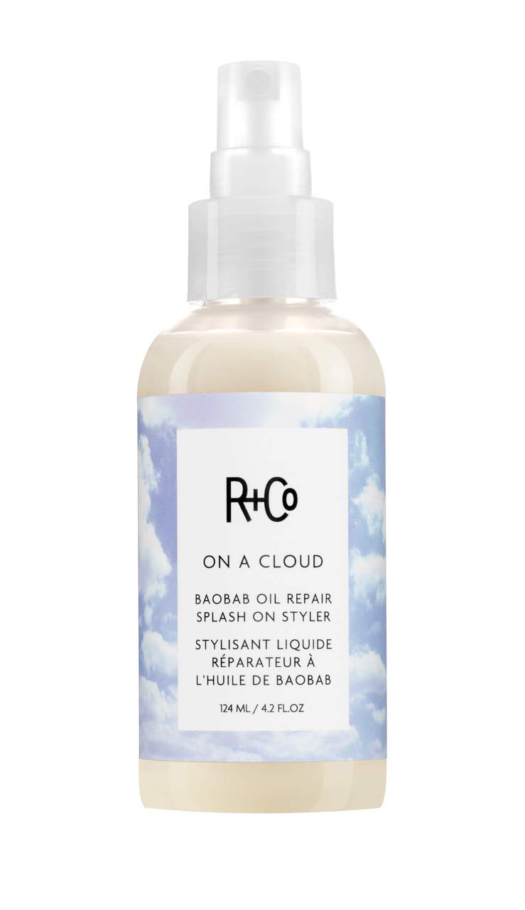 R+Co On A Cloud Baobab Oil Repair Splash bottle demonstrates a nourishing leave-in repair and shine.
